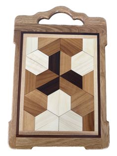 a wooden frame with an abstract design made out of wood