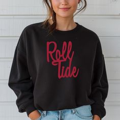 Also available as a t-shirt. See below. Get ready for game day and show your team pride with our Roll Tide Alabama Football Sweatshirt! This warm and cozy crewneck sweater is perfect for any Alabama fan. Whether you're cheering in the stands or watching from home, you'll be the most stylish fan in this Roll Tide sweatshirt. Casual Sweatshirt For Cheerleading In Winter, Casual Fall Cheerleading Sweatshirt, Casual Winter Sweatshirt For Cheerleading, Team Spirit Crew Neck Top For Tailgating, Tailgating Team Spirit Crew Neck Tops, Team Spirit Tops For Tailgating With Crew Neck, Collegiate Long Sleeve Sweatshirt For Cheerleading, Black Sweatshirt For Cheerleading In Fall, Oversized Varsity Sweatshirt For Game Day