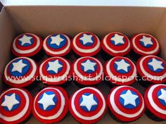 the cupcakes are decorated in red, white and blue icing with stars