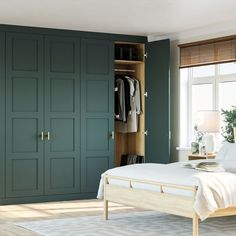 Forest Green Fitted Wardrobe With Oak Interior Green Closet Bedroom, Dark Green Wardrobe, Dark Green Closet, Built In Wardrobe Colour Ideas, Green Wardrobes Bedroom, Forest Green Wardrobe Bedroom, Forest Green Built Ins, Emerald Green Wardrobe, Coloured Built In Wardrobe