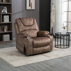 a brown recliner sitting on top of a rug in a living room