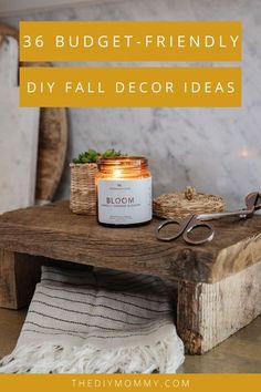 a wooden table topped with a jar of candles