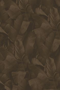 a brown background with lots of leaves on top of each other and the bottom one has a cell phone in it's hand