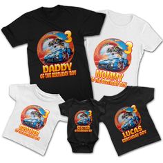 three baby onesuits with an image of a car on the front and back