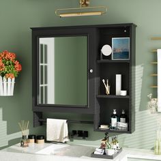 a bathroom with a sink, mirror and shelves on the wall next to each other