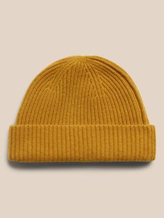 Inspired by fisherman's hats from the turn of the century, this luxuriously soft and warm cashmere beanie is designed in a shorter length so it sits higher up.  Ribbed knit design adds softness and a luxe texture.  Length: 9. 25" (23. 5cm) Ribbed Wool Beanie For Fall, Fall Wool Ribbed Beanie, Classic Beanie Hat For Winter, Classic Wool Hat With Soft Knit, Classic Wool Soft Knit Hat, Classic Knitted Beanie For Fall, Casual Cashmere Soft Knit Beanie, Classic Beanie Hats For Fall, Classic Beanie For Fall