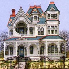 an old victorian style house painted in blue and white