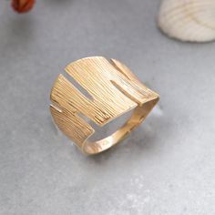 ★14K Solid Gold Textured Ring, 925 Sterling Silver Textured Ring, Dainty Ring, Shell Ring, Mother's Day Gift, Valentine's Day Gift, Christmas Gift★ ▷ MATERIAL ★ All of our 10K, 14K, 18K Jewelry are Solid Gold. ( Not Gold Filled or Gold Plated ) ★ All of our silver jewelry is 925 sterling silver and 14 carat gold plated. (Our white silver jewelry is rhodium plated.) ▷ PRODUCTION AND PACKAGING ★ Our jewelry is handmade. It is specially prepared for you in the dimensions you want upon order. ★ We w Fine Jewelry Hammered Rings For Gift, Fine Jewelry Dome Ring With Open Band As Gift, Elegant Hammered Dome Ring As Gift, Textured Gold Ring, Silver Leaf Ring, Heart Wedding Rings, Elephant Ring, Gold Heart Ring, Handmade Jewelry Ring