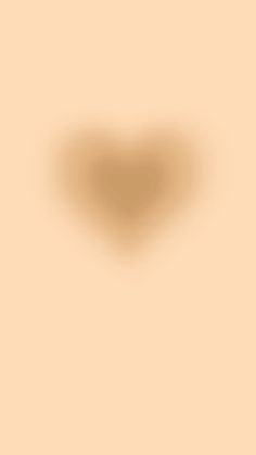 a heart shaped shadow on a beige background