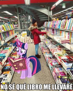 a woman standing in front of a book store filled with books and pony figurines