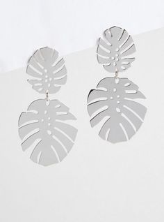 FIT Measures 2. 7” long. . MATERIALS + CARE Base metal. . Imported. DETAILS Palm leaf accent. High shine finish. The best plus size women's palm statement earring earrings in silver. Silver Leaf-shaped Earrings For Party, Silver Leaf-shaped Jewelry For Party, Metal Leaf-shaped Jewelry, Leaf-shaped Earrings For Summer, Silver Leaf-shaped Metal Earrings, Modern Silver Earrings For Summer, 10 Points, Fitted Wedding Dress, Statement Earring