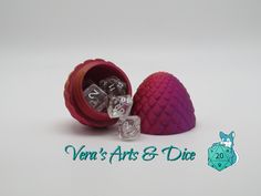 two dices in a red case with the words vein's arts & dice