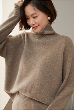 Material: 100% Cashmere Indulge in the epitome of comfort and luxury with our Turtleneck 100% Pure Cashmere Sweater. Crafted from the finest and softest cashmere, this sweater offers a warm embrace on chilly days. The classic turtleneck design not only provides added warmth but also exudes timeless sophistication. Care: To maintain its plush texture and long-lasting durability, we recommend professional dry cleaning or hand washing in cold water with a mild wool detergent. Gently reshape the swe