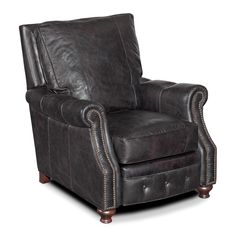 the leather chair is upholstered with studding and nailing on it's legs