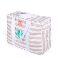 This travel bag is an essential for travel in 2022! Whether you are staying local or hitting the beach, this bag will leave you refreshed. Lightweight and resistance, the beautiful bag is anything but dainty. It is large enough to hold a stack of towels for the beach or picnic dinner for the park. El Gilberto comes monogrammed in the thread color of your choice. Its size and large handles were carefully designed to make it easier to carry on the shoulder, making it the perfect bag to carry every Travel Beach Bag With Removable Pouch In Rectangular Shape, Rectangular Travel Bags For Beach Season, Large Capacity Rectangular Beach Bag For Travel, White Casual Travel Bag With Luggage Sleeve, Casual White Travel Bag With Luggage Sleeve, Casual White Travel Duffle Bag, Large Capacity White Rectangular Travel Bag, White Large Capacity Bags For Weekend Trips, White Luggage With Everyday Sleeve