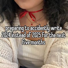 a woman wearing a red ribbon around her neck with the words preparing to accidently write 2012 instead of 205 for the next five months