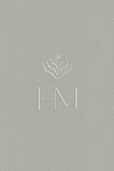 Green textured background with logo submark layered embossed on top Luxury Logo Branding, Calm Logo Design, Calming Branding, Wellness Logo Design Inspiration, Calming Logo, Luxury Logo Design Inspiration, Calm Branding, Hair Studio Logo, Brand Identity Design Luxury