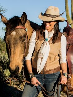 My hero's have always been cowgirls! This vest is everything! All season vest fashioned after our Italian leather bomber jacket. Hand stitched lapel and trim. Fine Italian chocolate and buckskin leather and beautiful rustic western finish. Vintage brass zipper. 32 to 42 chest sizing. These are fitted, so order accordingly. Model is wearing size Small. We often stock items but may have to custom build. Our team is fast, but depending on production they may take 4 to 6 weeks. Western Leather Vest For Fall, Western Rodeo Vest, Western Style Sleeveless Vest For Rodeo, Sleeveless Western Outerwear For Fall, Western Style Brown Vest For Western-themed Events, Brown Western Vest For Western-themed Events, Man Vest, Italian Chocolate, Mountain Man