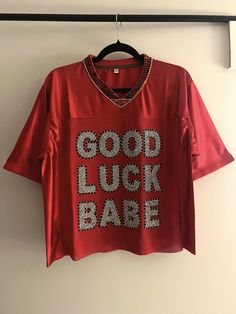 I am LOVING this shirt! Chappell inspired "Good Luck Babe" football jersey - like her stage costume! Handmade and modeled after her stage costume. Size small is best for sizes small/medium and Medium is best for a large/xl.  Large is best for Xxl + Keep in mind it's a jersey so it will be slightly oversized - like hers is on stage! Style is also cropped, but I leave it on the longer end so you can adjust as needed. Stage Style, I Am Loving, Stage Costume, Halloween 2024, Football Jersey, Football Jerseys, On Stage, Good Luck, Halloween Shopping