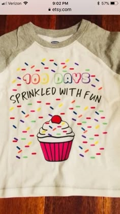 a white shirt with a cupcake and sprinkled with fun on the front