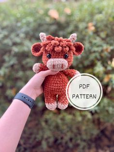 a hand holding a small stuffed animal in it's right hand, with the text pdf pattern below