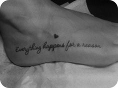 a black and white photo of a person's foot with the words everything happens for a reason written on it