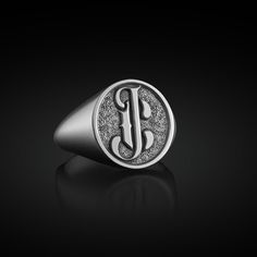 Personalized Signet Monogram Ring in Sterling Silver, Engraved Signet Mens Ring, Stackable Ring, Gift for Mom, Gift for Her, Pinky Ring This 925K Sterling Silver Personalized Signet Monogram Ring's photos are taken with original and every item is a handmade. It's very elegant and classy for everyday use and gives stylish look to your outfits. It also makes a great gift for him/her or your best friend. All details have been considered to make it the most meaningful and eye-catching gift.  As SilverByRevlis Team, we work for the pleasure of you and your loved ones. ✦ Item Details ✦ * Gender: Male/ Female * Stamp: 925 Sterling Silver * Finish: Oxidized * Ring Weight: 12-13 gr.(THE WEIGHT MAY CHANGE ACCORDING TO RING SIZES ) * Ring Size: 11 US (FOR IN THIS PICTURE) * All our products are handm Classic Silver Engraved Logo Ring, Luxury Silver Jewelry With Engraved Logo, Anniversary Silver Engraved Ring, Classic Ring With Engraved Logo, Classic Jewelry Ring With Engraved Logo, Classic Engraved Logo Ring, Classic Engraved Ring With Logo, Silver Jewelry With Engraved Logo, Silver Rings With Engraved Logo For Anniversary