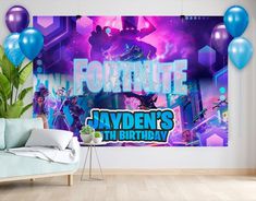 the fortnite birthday banner is displayed in front of a room with balloons and a couch