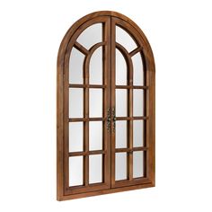 an arched wooden window with glass panes on the outside and inside, against a white background