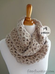 a crocheted scarf on a mannequin with the words free pattern below it