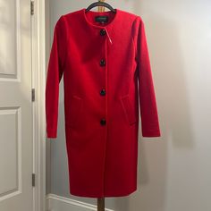 Ann Taylor New Size Xxs Red Flu Length Coat In Pristine Condition Never Worn. Although Sized At Xxs, Really Size 2 Or Xs. Fully Lined With Lined Pockets. Red Single Breasted Button-up Outerwear, Casual Red Outerwear With Snap Buttons, Red Long Sleeve Outerwear With Button Closure, Red Button-up Outerwear With Snap Buttons, Red Fall Outerwear With Snap Buttons, Red Outerwear With Snap Buttons For Fall, Red Fitted Outerwear With Snap Buttons, Red Long Coat With Button Closure, Red Fitted Long Sleeve Outerwear