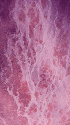 an abstract pink and purple marble background