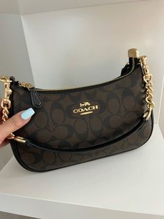 Coach, coach bag, designer bag, teri shoulder bag, purse Simple Purses Casual, Green Coach Bag Outfit, Shoulder Coach Bag, Coach Shoulder Purse, Cute Shoulder Bags Purses, Teri Bag Coach, Coach Shoulder Bag Aesthetic, Things To Keep In Purse, Coach Terri Bag