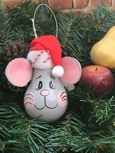 a christmas ornament with a mouse on it