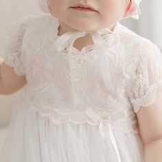 Cotton Baptism Gown - Joli Christening Gown - ChristeningGowns.com – Baby Beau and Belle Feminine Lace Gown With Lace Bodice, Feminine Lace Bodice Gown, Spring Ceremony Lace Dress, Spring Lace Baptism Dress With Lace Collar, Pink Lace Bodice Dress For Baptism, Spring Lace Gown With Scalloped Details, Spring Lace Gown With Scalloped Lace, Pink Lace Feminine Gown, Feminine Pink Lace Gown