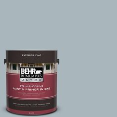 a white paint can with the words behr premium plus painted on it's side