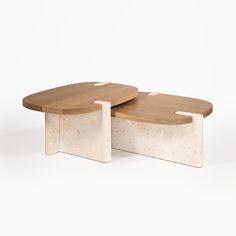 two wooden tables sitting side by side on top of each other in front of a white background