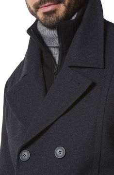 A knit jersey bib adds a contemporary layered look to a water-resistant peacoat that's an outerwear essential. 30 1/2" length (size Medium) Lined 46% wool, 40% polyester, 5% acrylic, 4% nylon, 3% rayon, 2% cotton Dry clean Imported Peacoat Men, Officine Creative, Marc New York, Men's Knit, Charcoal Color, Outerwear Coats, Layered Look, Heather Black, Mens Coats