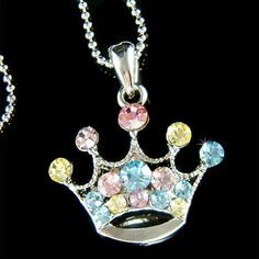 "PERFECT CHRISTMAS GIFT FOR LADIES You are getting a Princess / Queen Crown Pendant with Swarovski crystals. It comes with a FREE 16\" Original Rhodium Plated Snake Chain necklace with lobster clasp. Crown size is 15/16\" (2.2cm) wide X 1\" (2.5cm) high. Crystal Color: Aqua + Light Sapphire Prices are in US$. For shipping policies and other important information, click on \"profile\" on the right. See an item that you like but has already been sold? Contact me to see if I have more! Thank you fo Cubic Zirconia Crystal Necklace With Rhinestones As Gift, Personalized Princess Style Jewelry For Gifts, Personalized Princess Style Jewelry Gift, Princess Crown Jewelry Gift, Sparkling Crystal Rhinestone Necklace Gift, Gift Charm Necklaces With Rhinestones, Princess Style Silver Jewelry Gift, Rhinestone Jewelry Christmas Gift, Crystal Crown Jewelry For Gifts