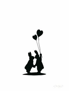 two rabbits holding balloons in the shape of heart shaped hearts, one is black and white