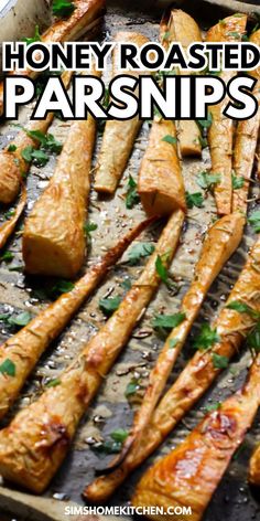 honey roasted parsnips on a baking sheet with text overlay that reads honey roasted parsnips