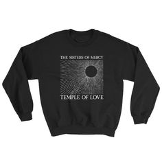 Sisters of Mercy Sweatshirt• 8.0 oz., 50/50 cotton/polyester• Pre-shrunk• Classic fit• Reduced pilling and softer air-jet spun yarn• 1x1 athletic rib knit collar, cuffs and waistband, with spandex• Double-needle stitched collar, shoulders, armholes, cuffs and waistband Gothic Cotton Halloween Sweatshirt, Band Logo Crew Neck Sweatshirt, Black Gothic Cotton Sweatshirt, Gothic Crew Neck Top With Letter Print, Punk Letter Print Sweatshirt For Concert, Punk Style Letter Print Sweatshirt For Concert, Gothic Cotton Tops With Screen Print, Gothic Cotton Top With Screen Print, Gothic Printed Cotton Top