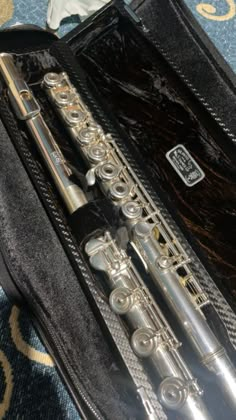 the flute is in its case and ready to be played