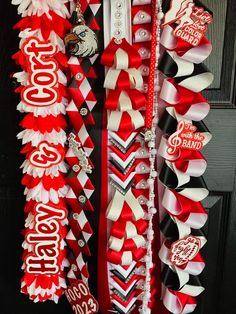 red, white and black cheerleader ribbon wreath