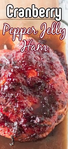 an image of cranberry pepper jelly ham on a cutting board with text overlay