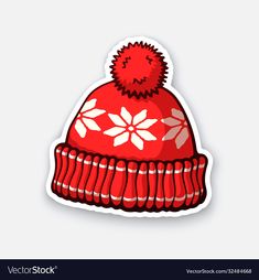 red winter hat with pom - pom on the top and white snowflakes