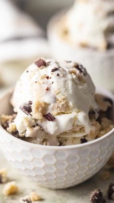 a bowl filled with ice cream on top of a table