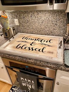 a kitchen counter with a cutting board that says, i love you and be loved