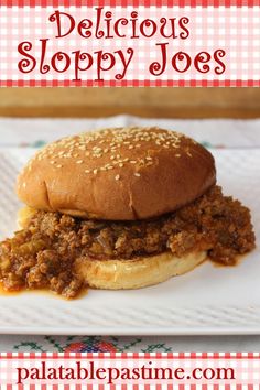 a sloppy joe sandwich on a plate with the words delicious sloppy joes