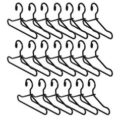 a bunch of clothes hangers that are hanging on the wall, with hooks attached to them